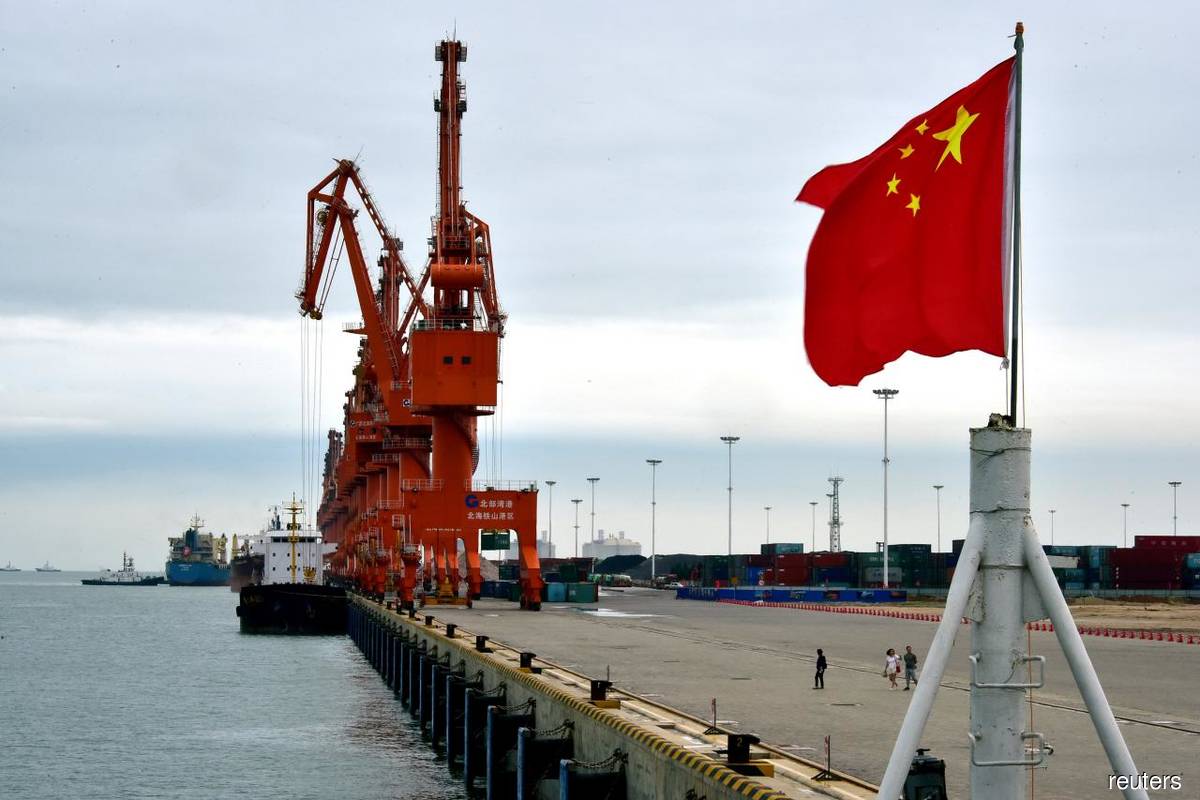 A Chinese port. Malaysia has a free trade agreement (FTA) with China via the ASEAN-China FTA. (Photo by Reuters)